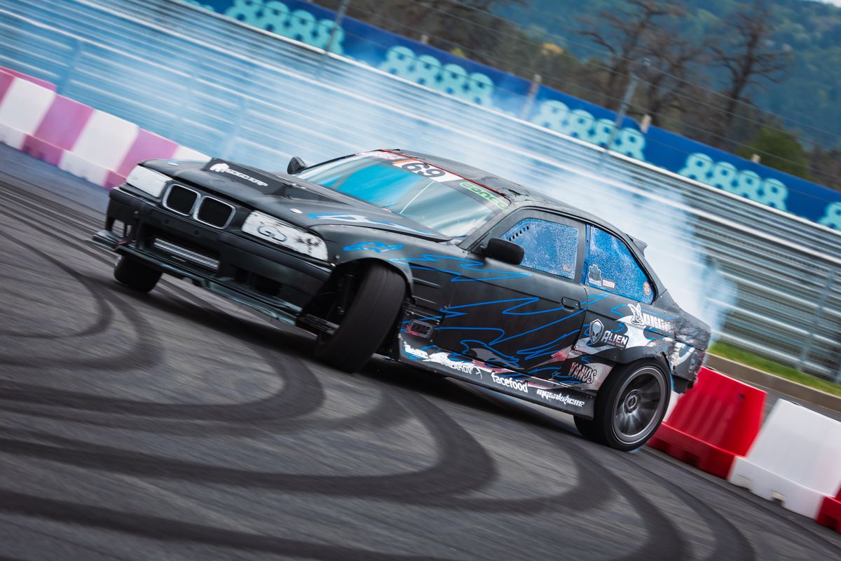 Drift run, full lock through the smoke