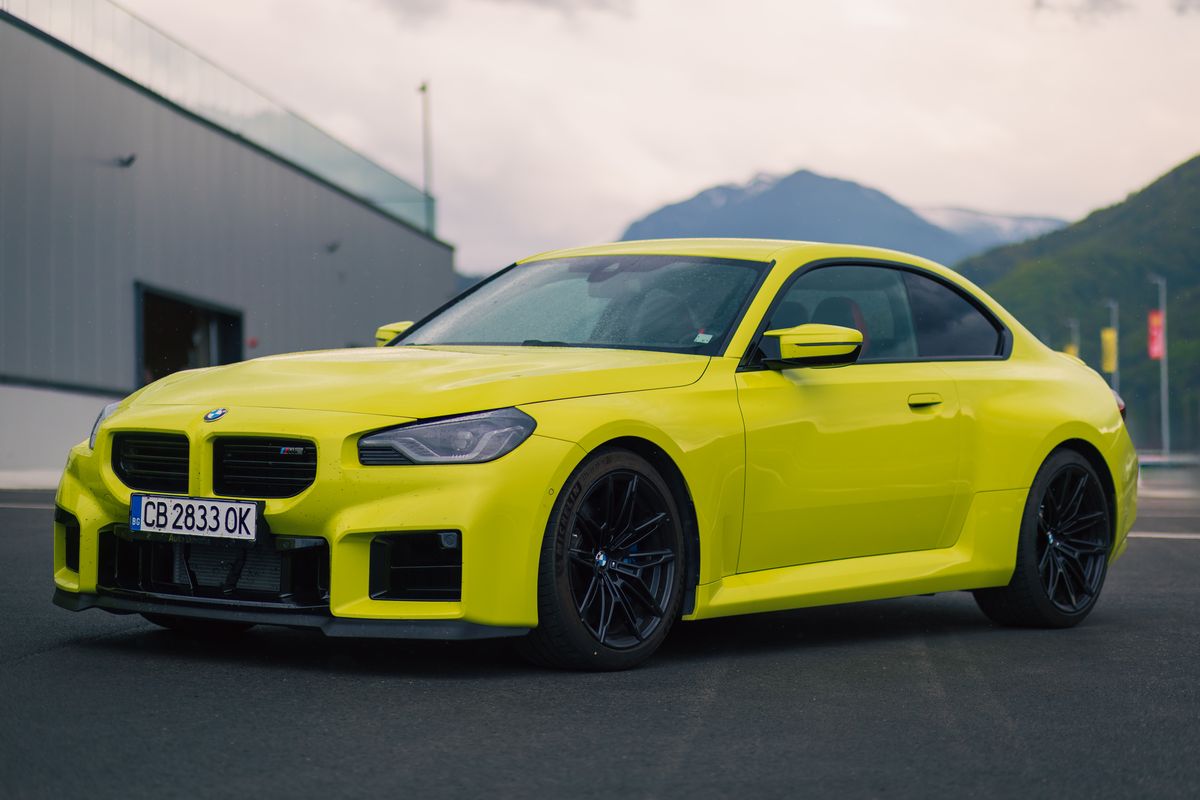 BMW M2 with the mountains behind